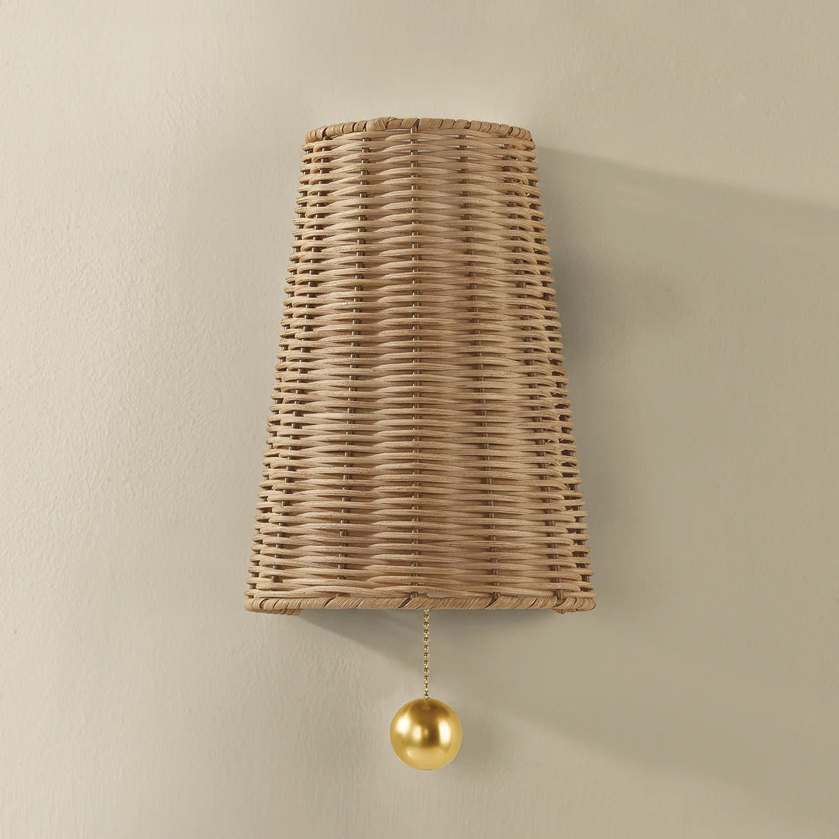 Naida Hand-Woven Rattan Wall Sconce with Aged Brass Pull