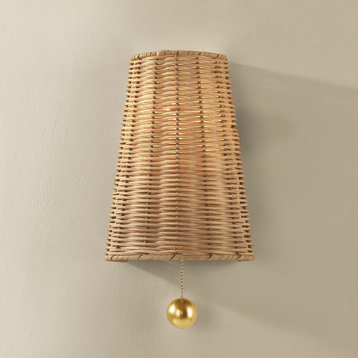 Naida Hand-Woven Rattan Wall Sconce with Aged Brass Pull