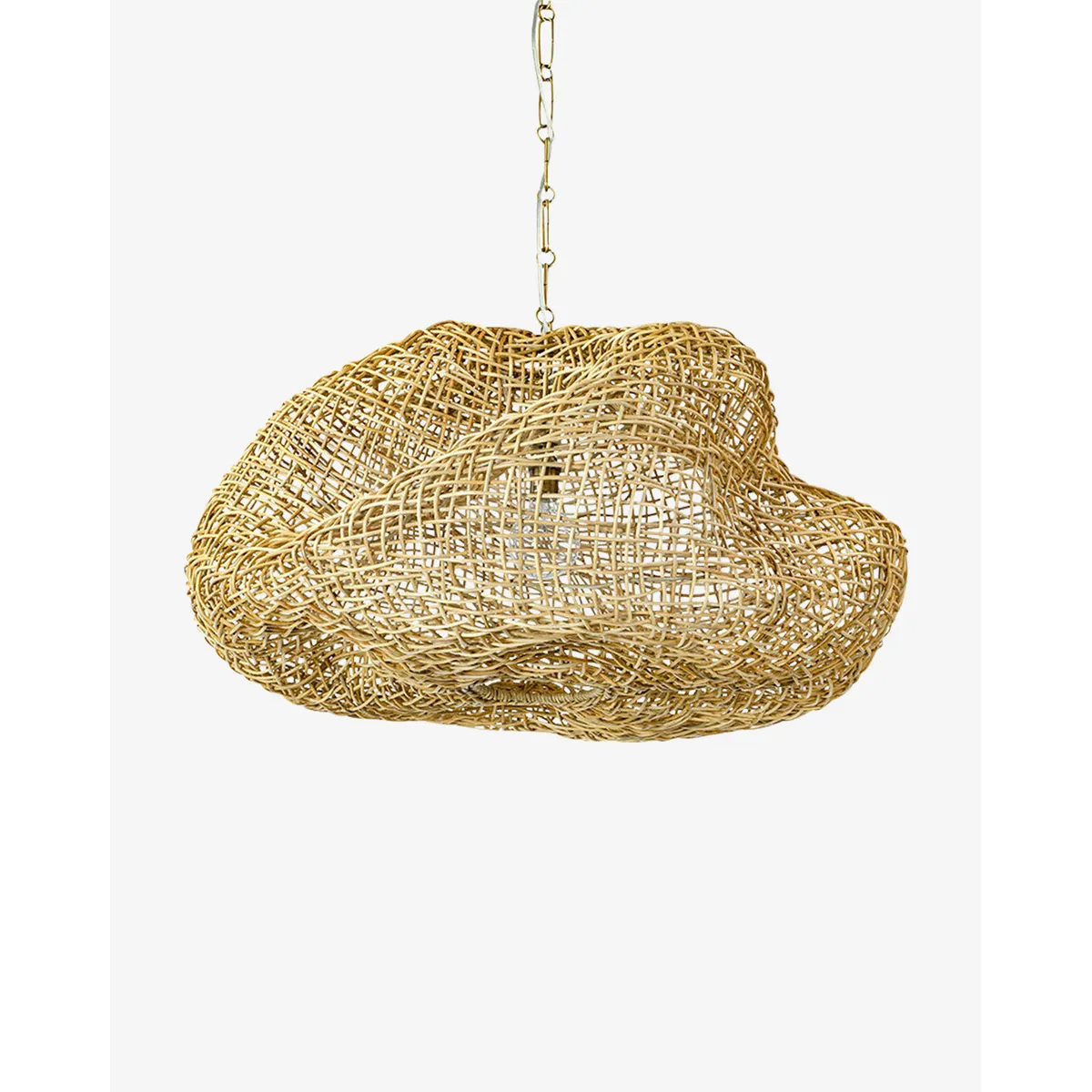 Andorra Wicker Pendant artisan handwoven rattan hanging light with warm dappled glow above dining table in bohemian interior