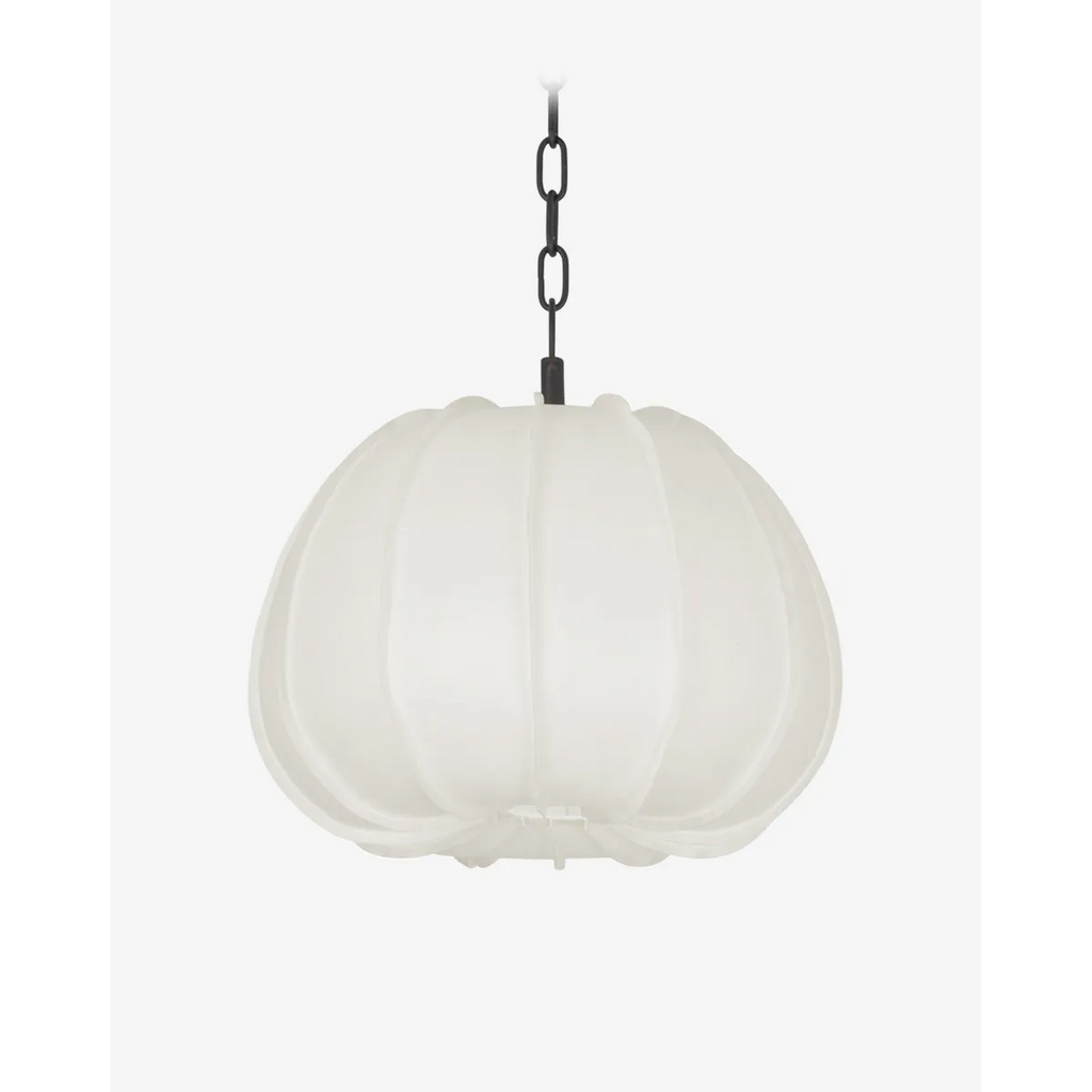 Bayu Pendant Southeast Asian artisan natural organic hanging light with warm airy glow above dining table in bohemian interior