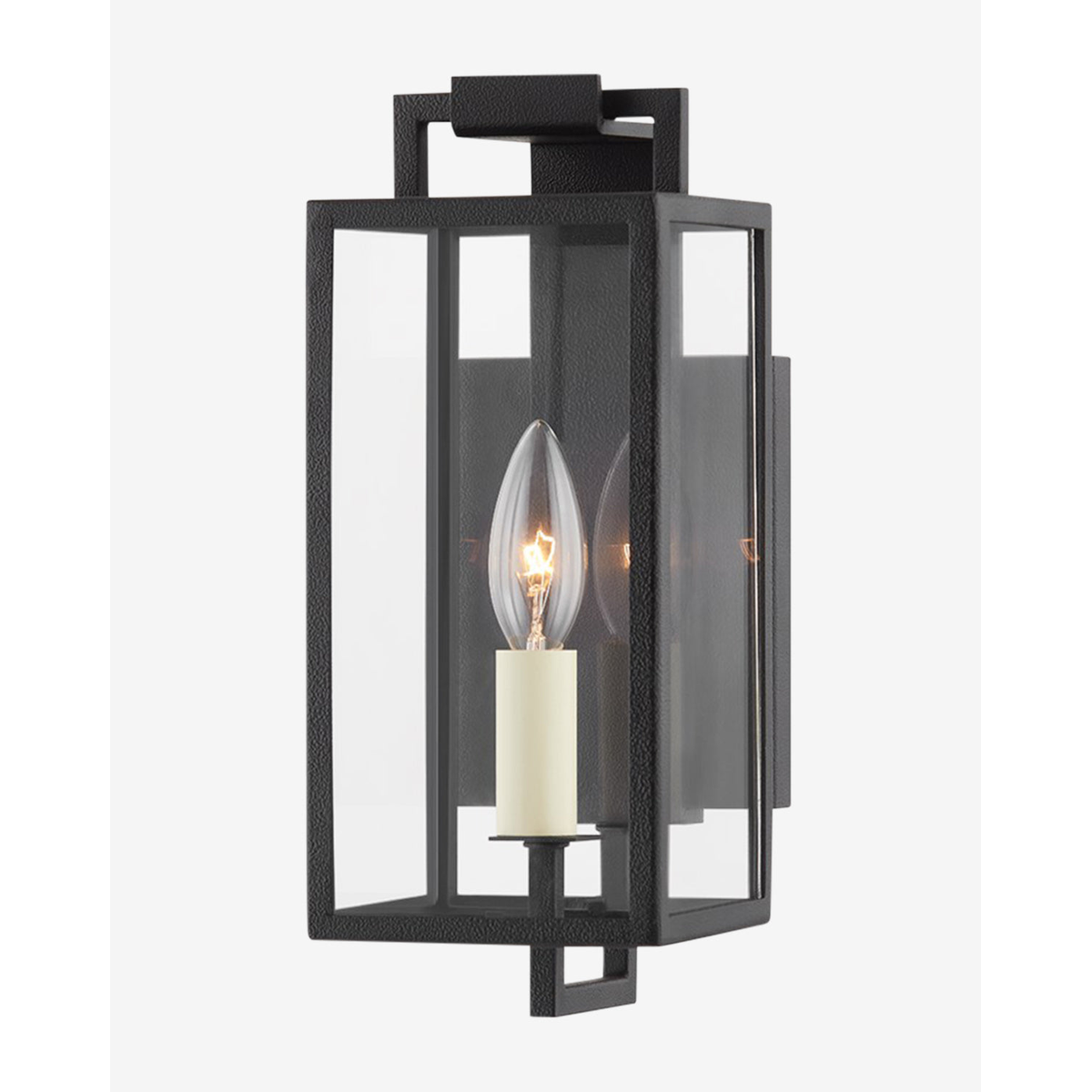 Beckham Wall Sconce Art Deco-inspired stepped chrome wall light with warm ambient glow in glamorous living room interior