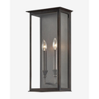 Chauncey Sconce vintage-inspired aged nickel wall light with opal glass shade and warm ambient glow in elegant hallway