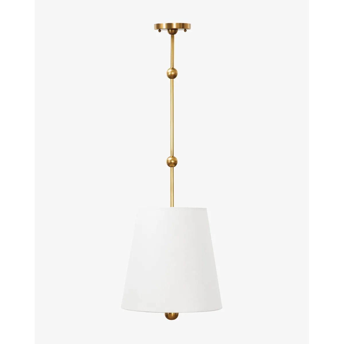 Kipling Pendant colonial-inspired antique brass hanging light with rich warm downlight in elegant study interior