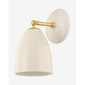 Kirsten Wall Sconce fluted ribbed glass wall light with brass detailing and warm soft ambient glow in elegant bedroom interior