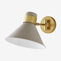 Lane Sconce simple cylinder wall light with warm focused downlight in modern hallway interior