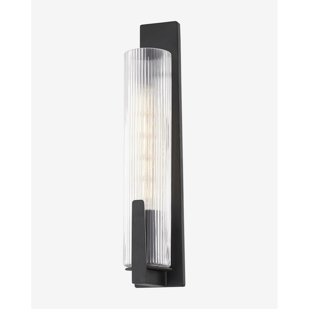 Malakai Sconce bold sculptural wall light with warm dramatic ambient glow in modern living room interior
