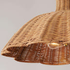 handwoven rattan pendant light with aged brass hardware