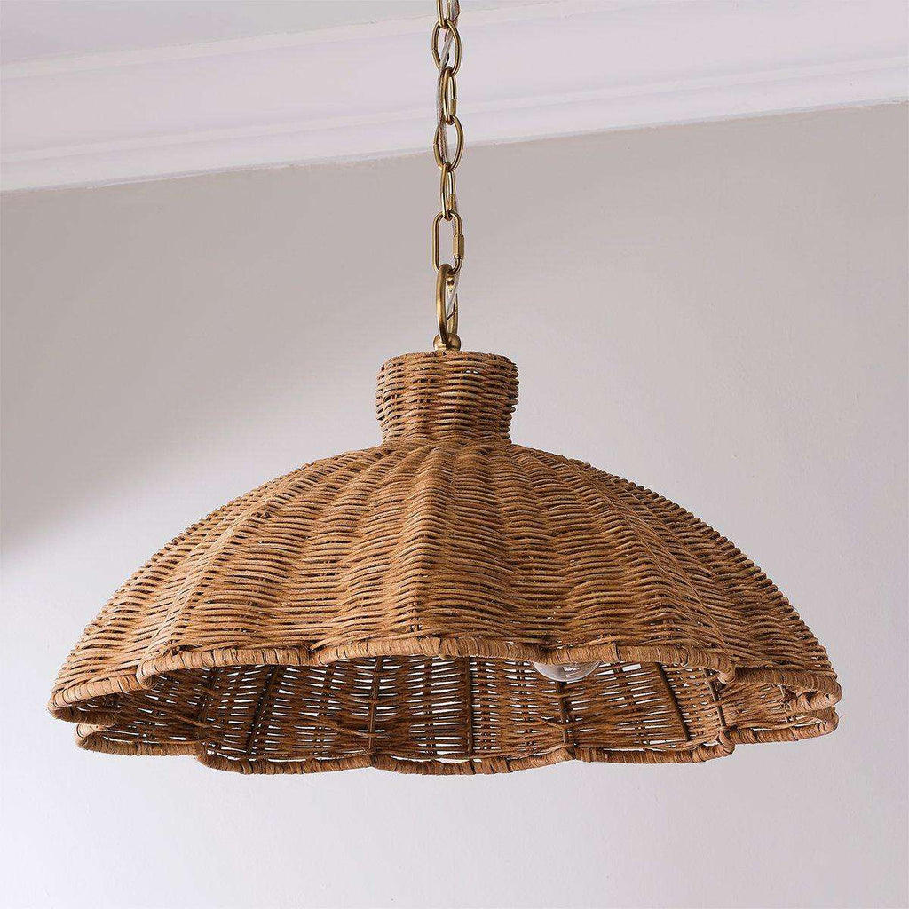 Handwoven rattan pendant light with aged brass hardware