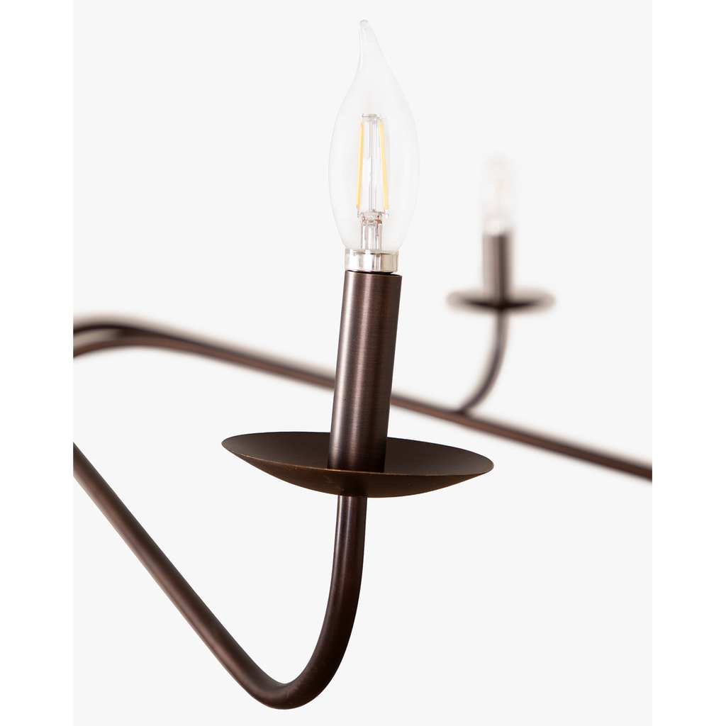 Philomena chandelier with sweeping arms and candle lights