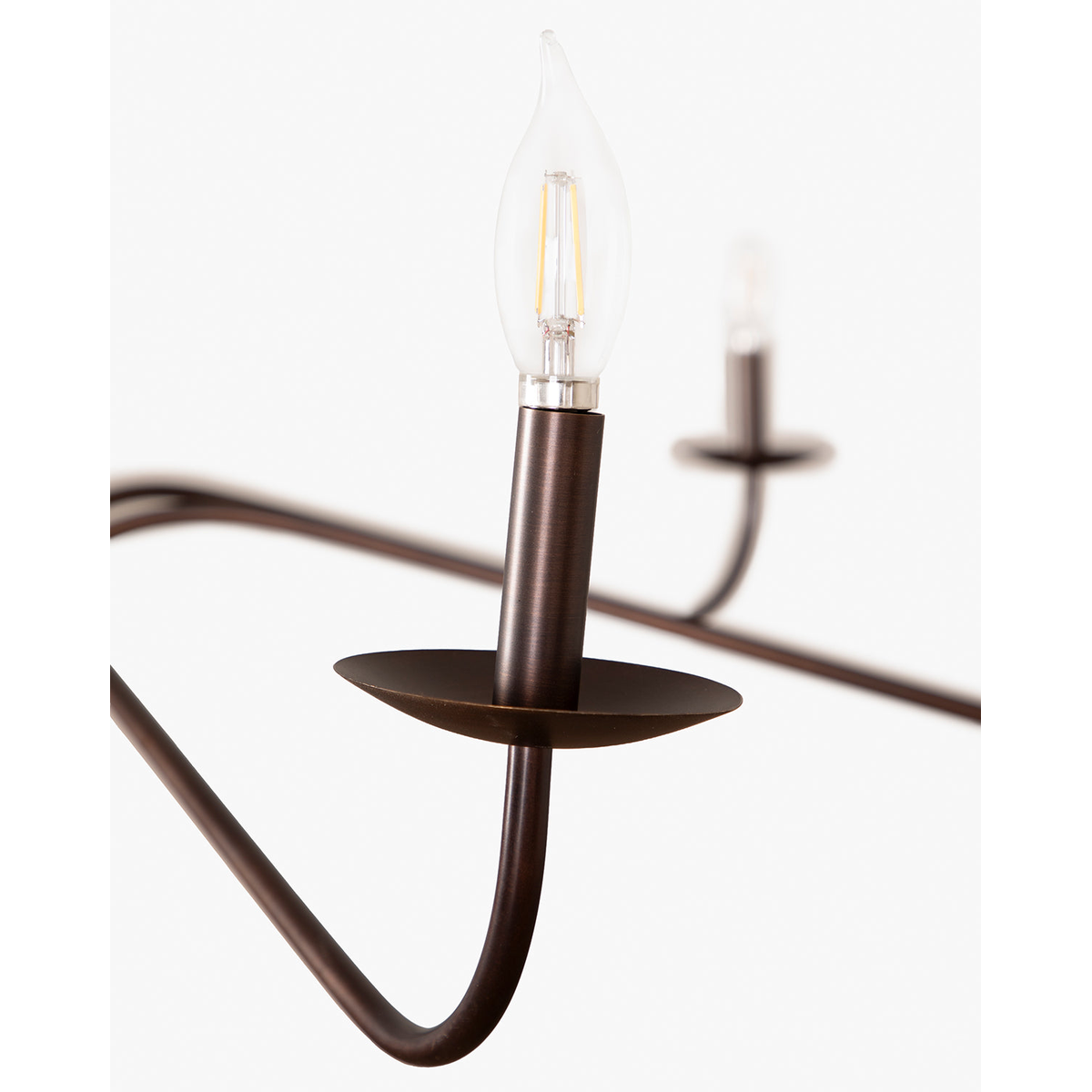 Philomena chandelier with sweeping arms and candle lights