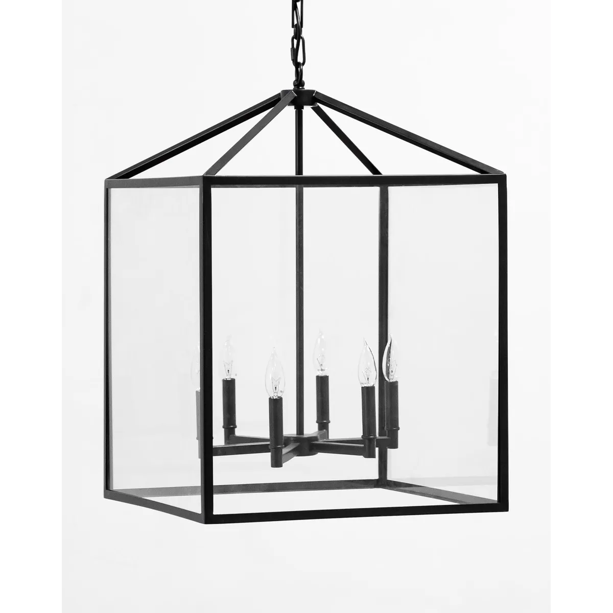 Pietro Lantern Pendant Italian-inspired geometric open-frame hanging lantern with warm ambient glow in elegant dining room