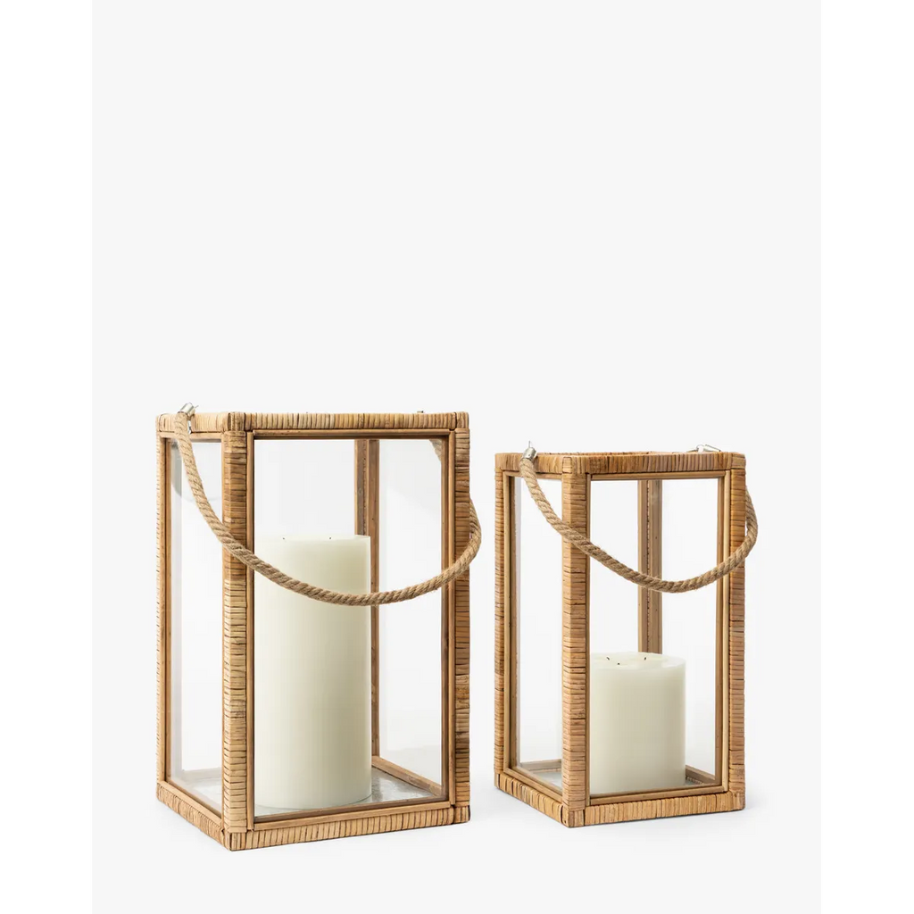 Rattan and Glass Lantern natural rattan frame clear glass panel lantern with warm even glow in bohemian living room interior