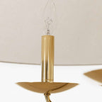 Townes chandelier with reeded brass rods and linen shade