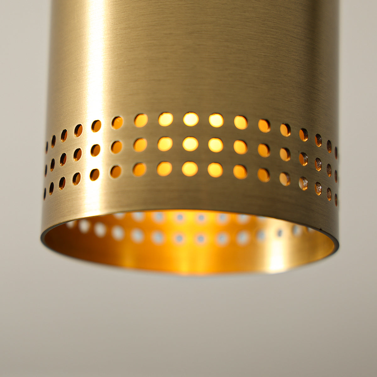 One-Light Perforated Steel Flush Mount Downlight in Brass or Bronze