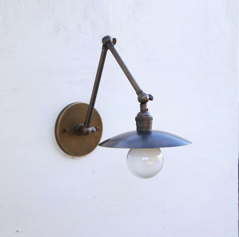 round brass wall sconce