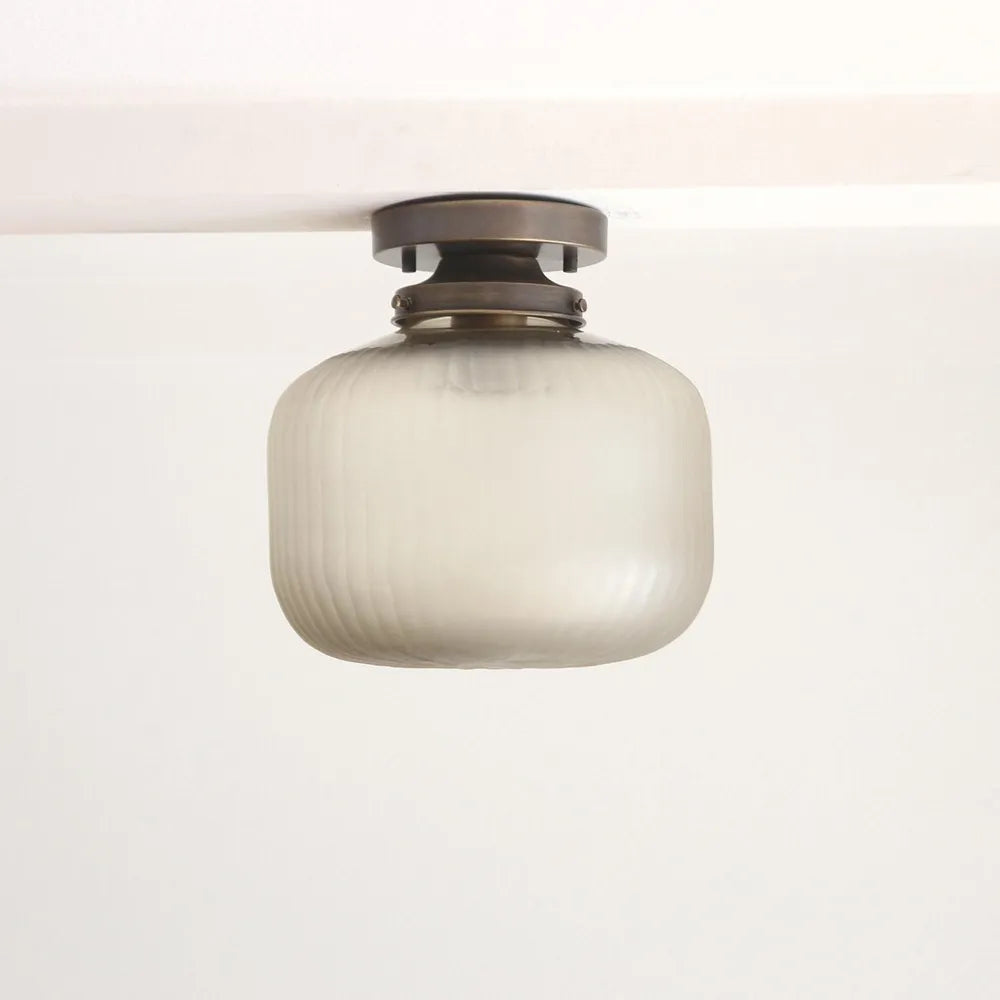 Contemporary Brass Flush Mount Ceiling Light with Textured Glass Shade