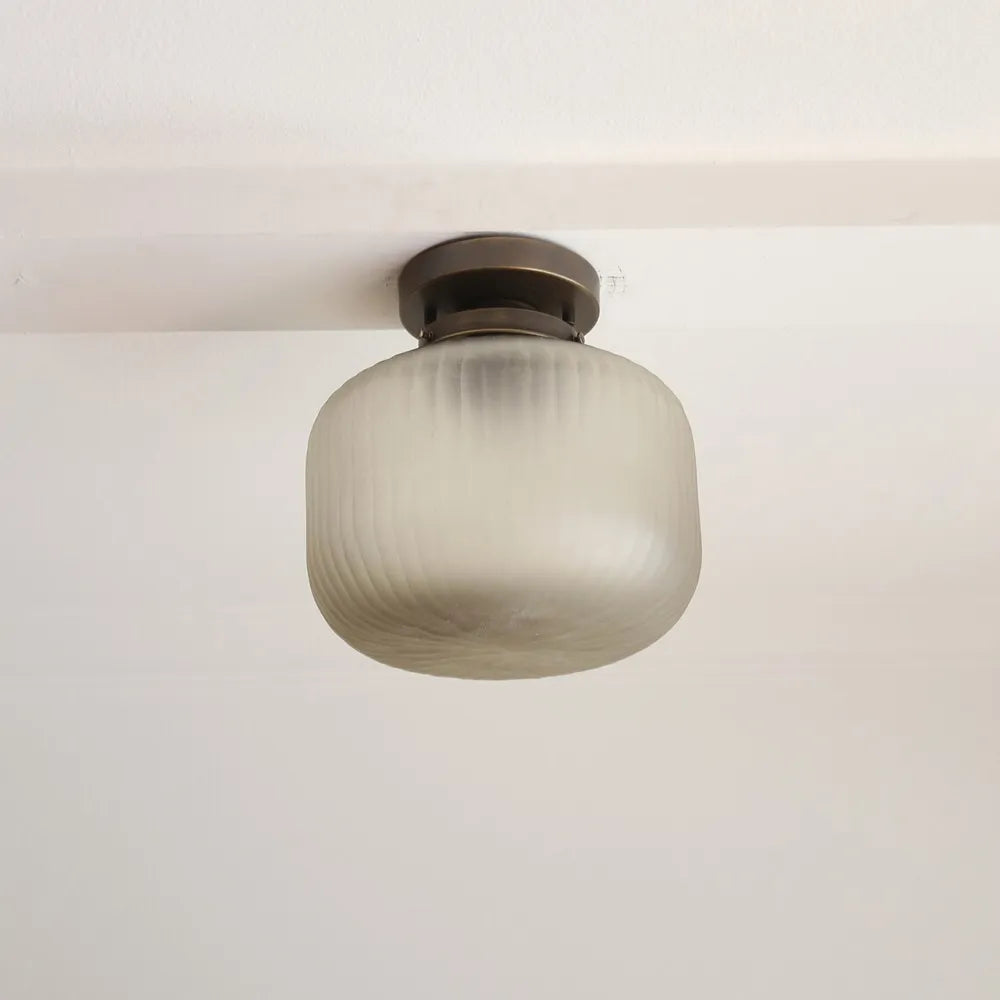 Contemporary Brass Flush Mount Ceiling Light with Textured Glass Shade