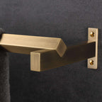 brass bathroom wall art