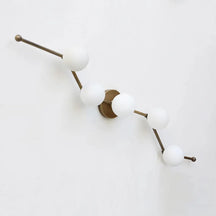 Modern Brass Wall Sconce with White Glass Globe for Vanity - View 2
