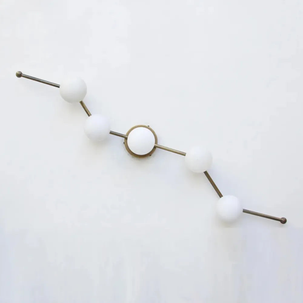 Modern Brass Wall Sconce with White Glass Globe for Vanity - View 3