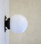 globe shade sconce