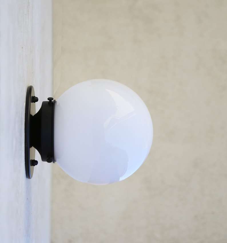brass base sconce