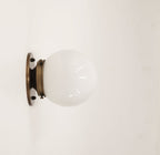 globe shade brass sconce