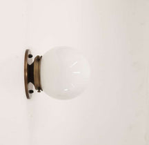 brass base wall sconce light