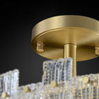 textural glass chandelier in brass
