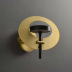 minimalist brass wall sconce
