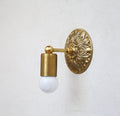 embossed round sconce