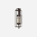 Judy Forged Iron Clear Glass Indoor Outdoor Lantern Sconce weather-rated wall light with warm classic glow mounted on porch exterior wall