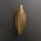 sleek gold wall sconce