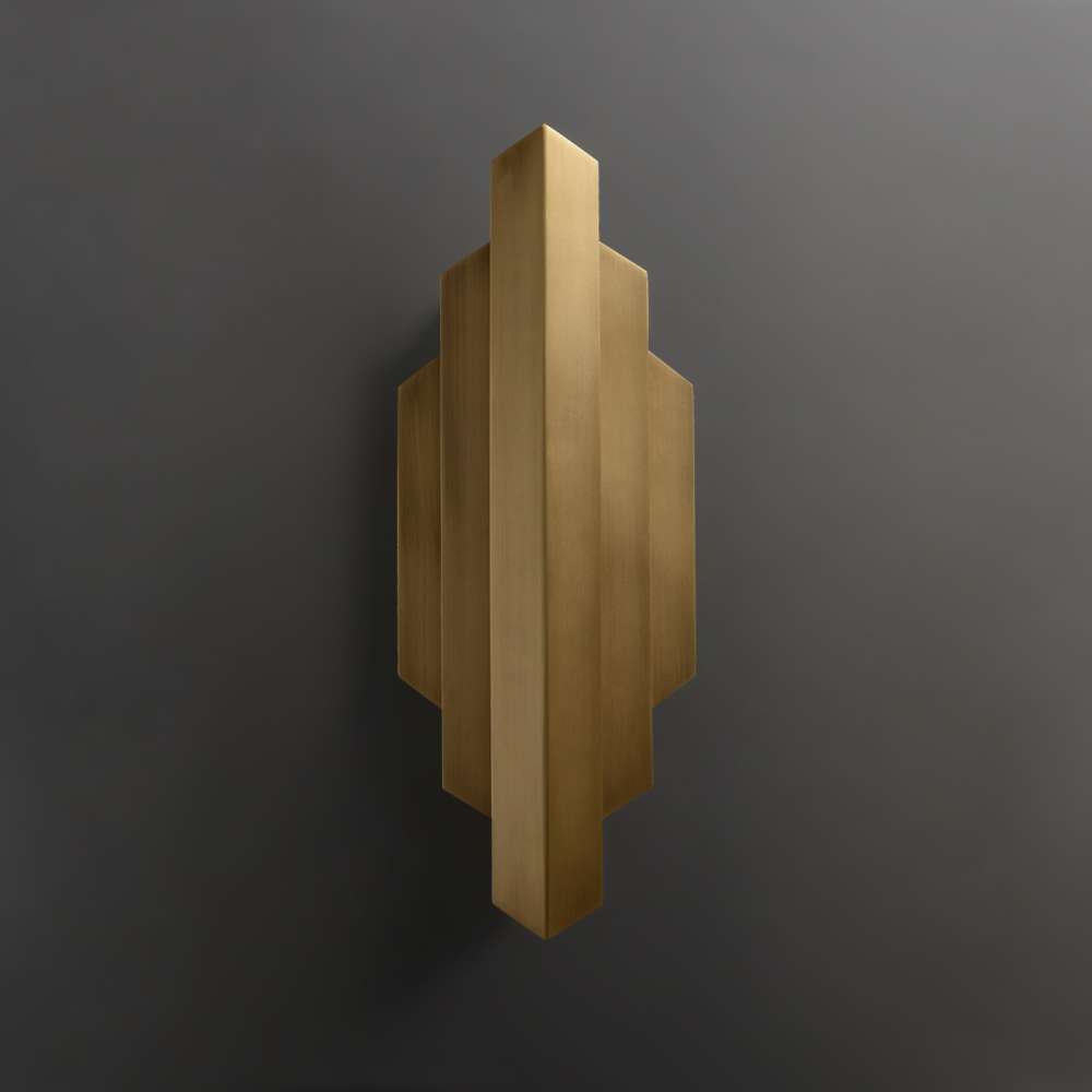 sleek gold wall sconce