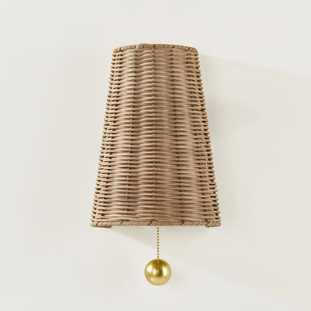 Naida Sconce | Hand-Woven Rattan Coastal Wall Sconce with Aged Brass Pull