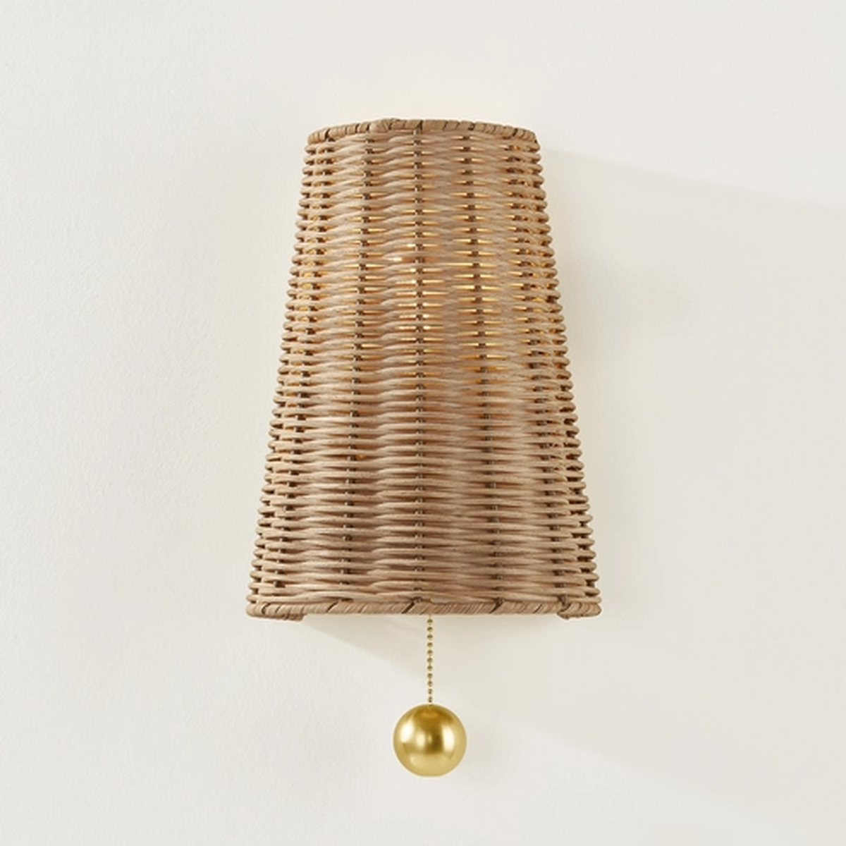 Naida Sconce | Hand-Woven Rattan Coastal Wall Sconce with Aged Brass Pull