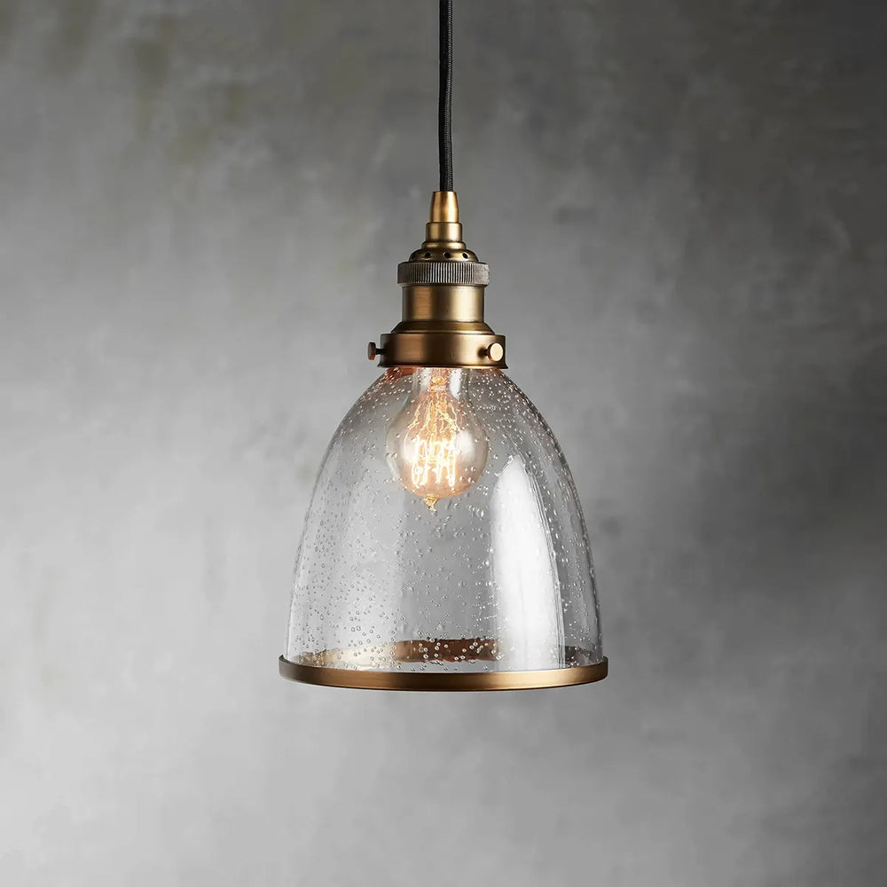 industrial cloche pendant in antiqued brass