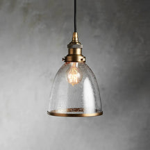 industrial cloche pendant in antiqued brass