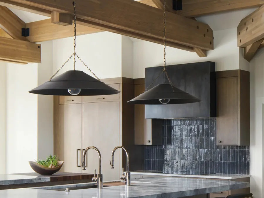 Black pendant over a kitchen island