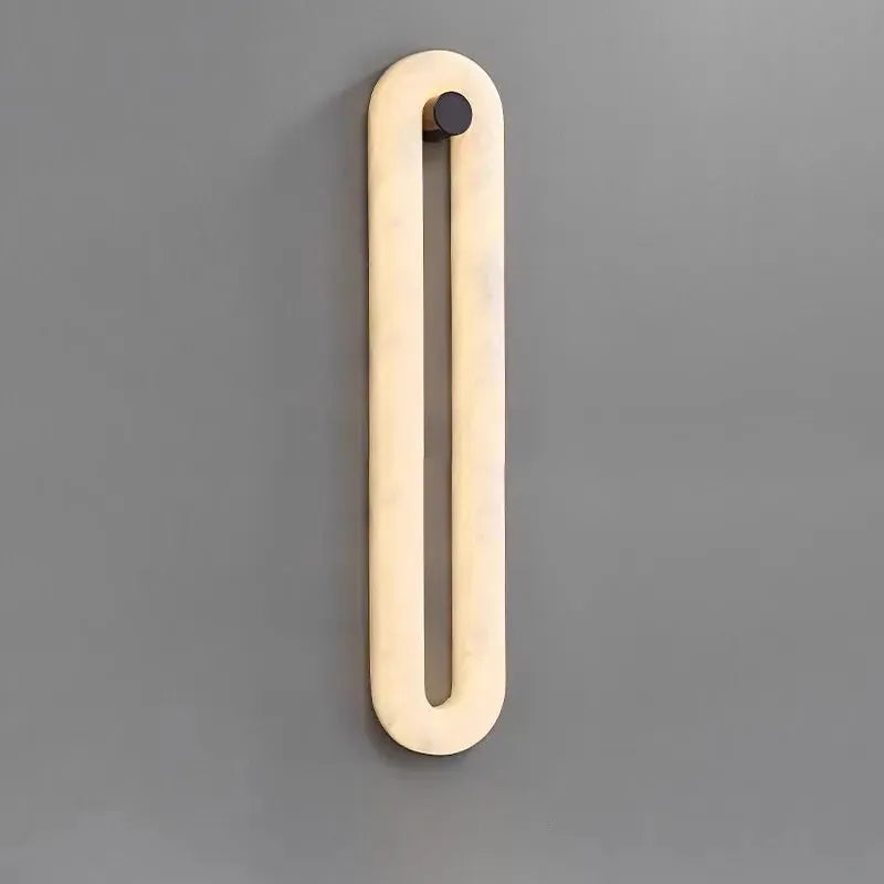 Alabaster elliptical wall lamp, glowing