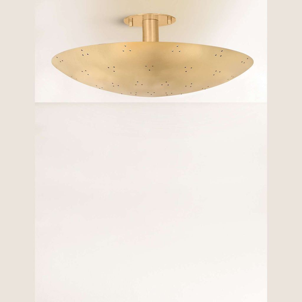 Kerris Perforated Disc Flush Mount Ceiling Light sculptural precision-perforated metal disc ceiling light with warm patterned glow in modern bedroom