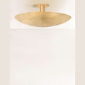 Kerris Perforated Disc Flush Mount Ceiling Light sculptural precision-perforated metal disc ceiling light with warm patterned glow in modern bedroom