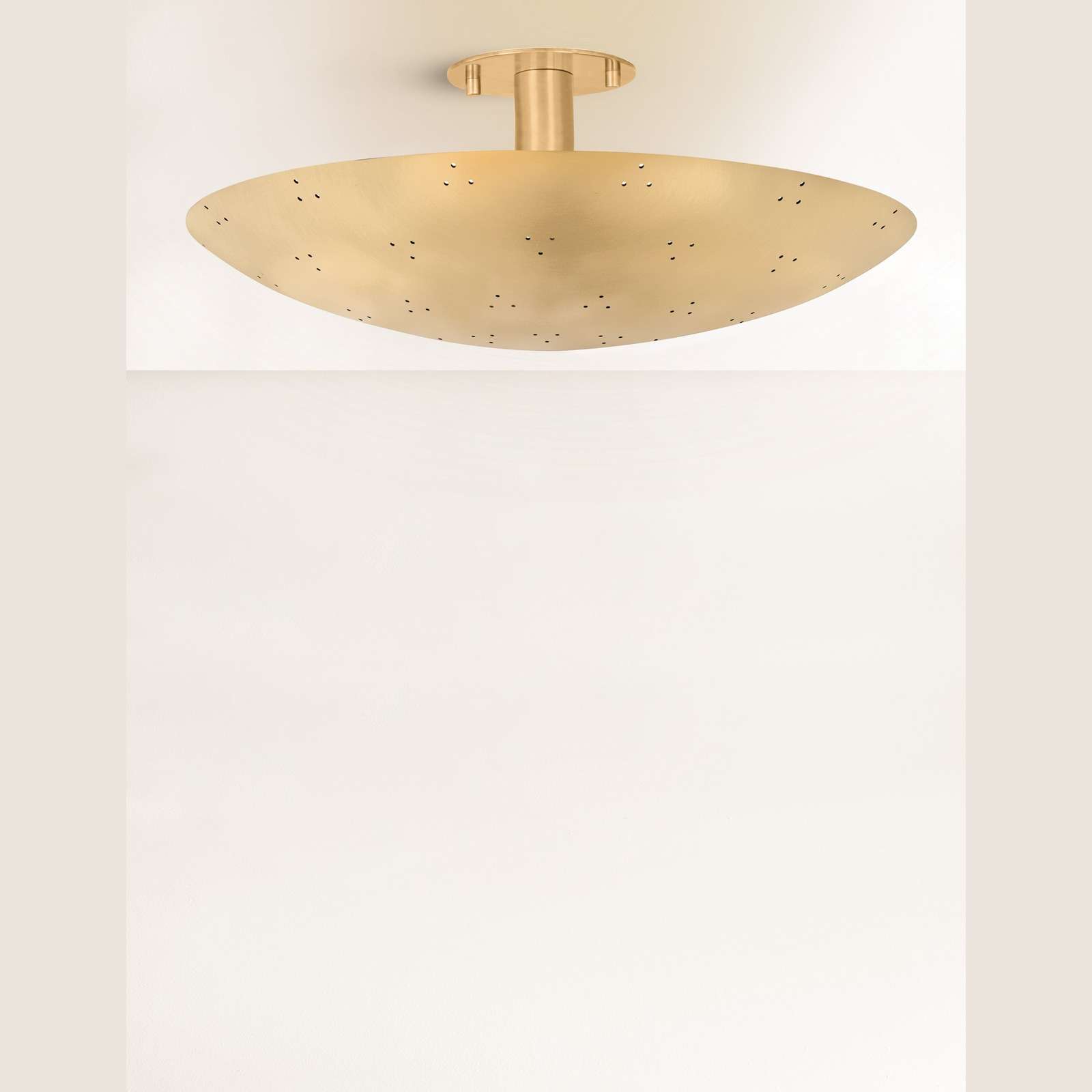 Kerris Perforated Disc Flush Mount Ceiling Light sculptural precision-perforated metal disc ceiling light with warm patterned glow in modern bedroom