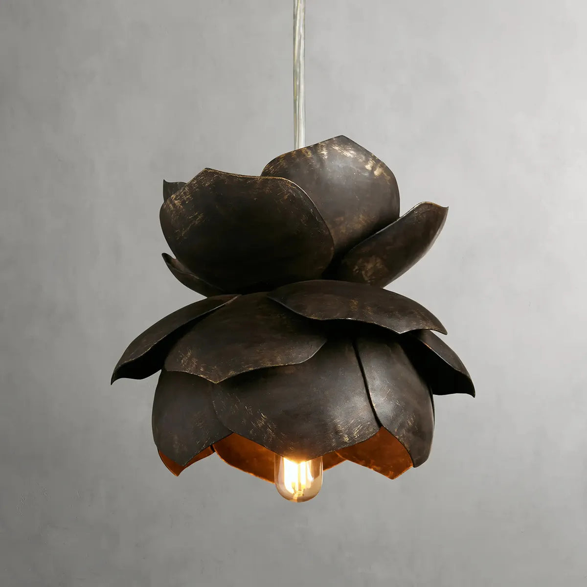 Lorca Pendant handcrafted ceramic hanging light with artisan finish over kitchen island casting warm downlight
