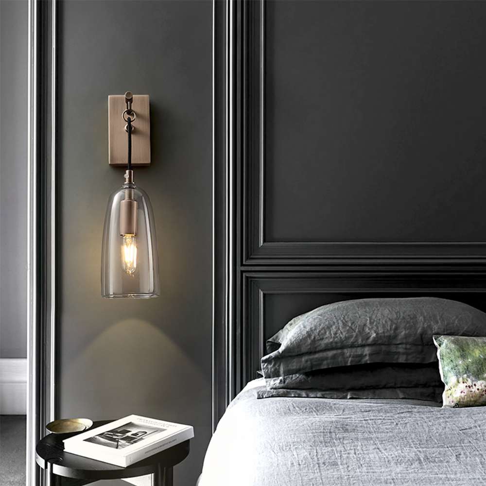 lure wall light in brass finish