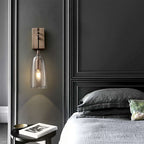 lure wall light in brass finish