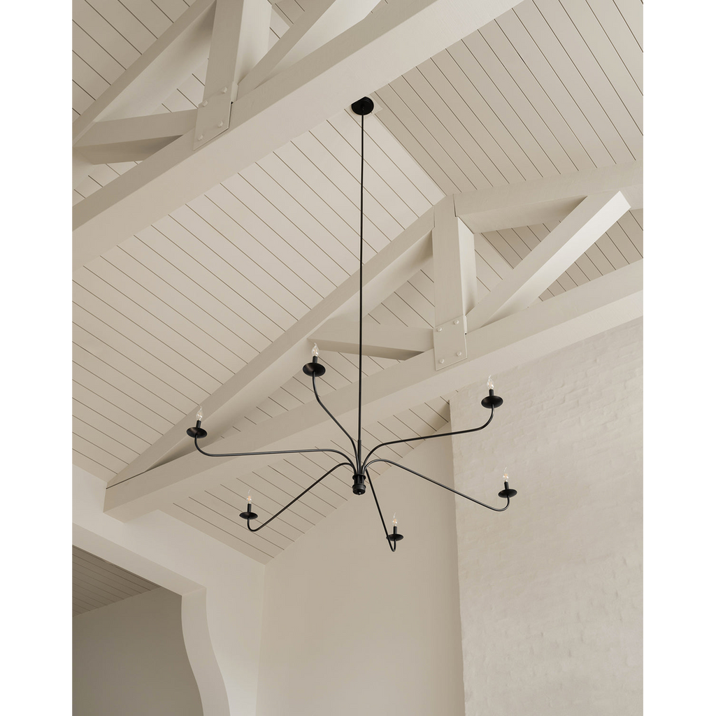Philomena chandelier with sweeping arms and candle lights