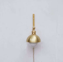 minimalist brass wall sconce