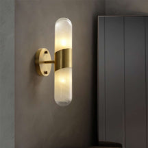 minimalist brass wall sconce