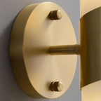 sleek brass wall fixture